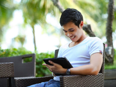 Man Smiling With Laptop